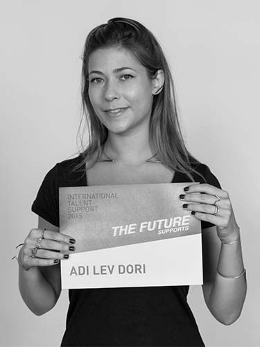 a woman holding a sign that says the future sound