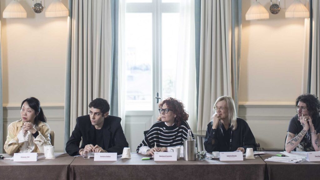 a group of people sitting at a table